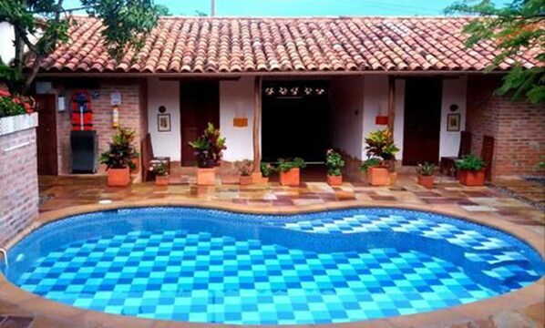 Outdoor pool, open 8 AM to 9 PM, sun loungers