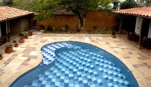 Outdoor pool, open 8 AM to 9 PM, sun loungers