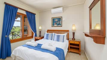 Superior Villa | 2 bedrooms, in-room safe, iron/ironing board, cots/infant beds