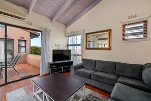 Standard Triple Room, 3 Bedrooms | Living area | Flat-screen TV, ping pong - San Lameer Villa Rentals 2015 (Southbroom)