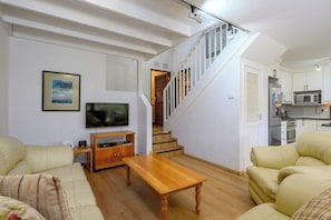 Standard Triple Room | Living area | LCD TV
