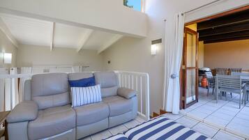 Classic Villa | Living area | Flat-screen TV, table tennis