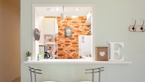 Chambre, plusieurs lits, non-fumeur | Cuisine privée