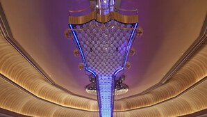 A spacious indoor venue with a central stage, multiple seating areas, and a distinctive ceiling design. - Hard Rock Hotel & Casino Atlantic City (Atlantic City)