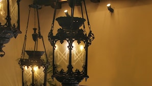 A view from a room with a patterned floor, a wooden door leading outside, and hanging lanterns. - Verde Morada Hotel Encuentro (Valladolid)