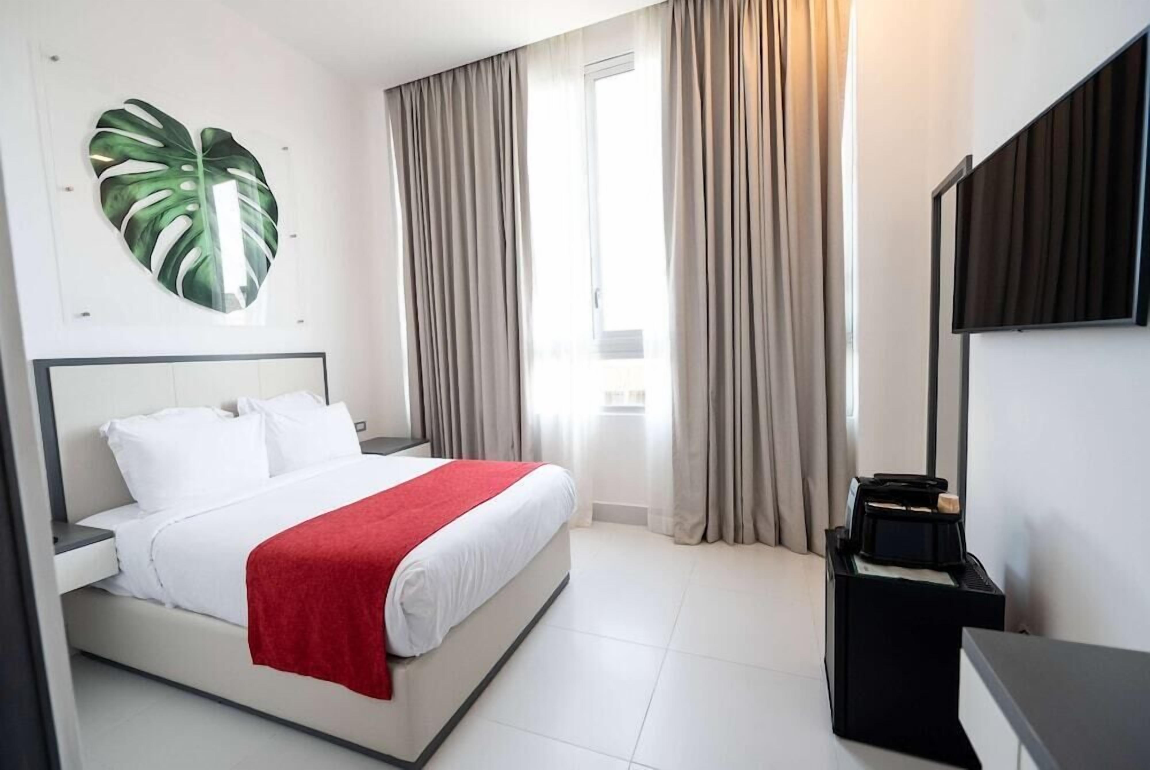 In-room safe, blackout drapes, iron/ironing board