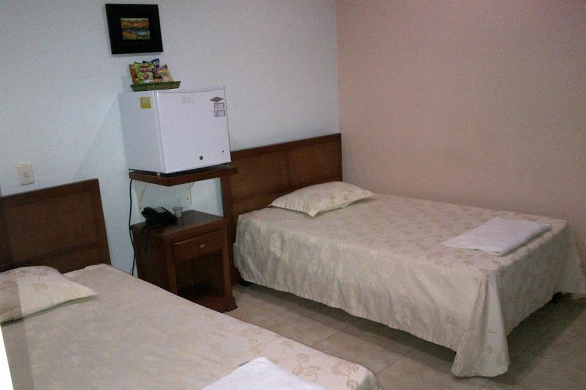Basic Twin Room, Non Smoking | Minibar, desk, free WiFi, bed sheets