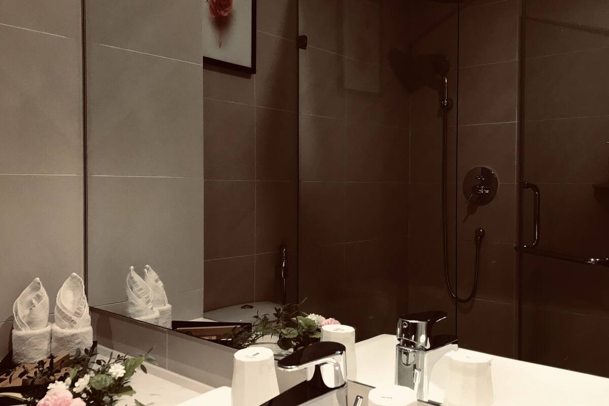 peaceful apartment | bathroom | shower, rainfall showerhead, free toiletries, hair dryer