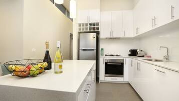 Executive Penthouse, 2 Queen Beds, Non Smoking | Private kitchen | Full-sized fridge, microwave, oven, stovetop