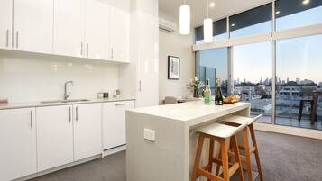 Executive Penthouse, 2 Queen Beds, Non Smoking | Private kitchen | Full-sized fridge, microwave, oven, stovetop