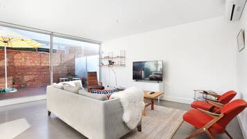 55-inch flat-screen TV with digital channels, TV, Netflix