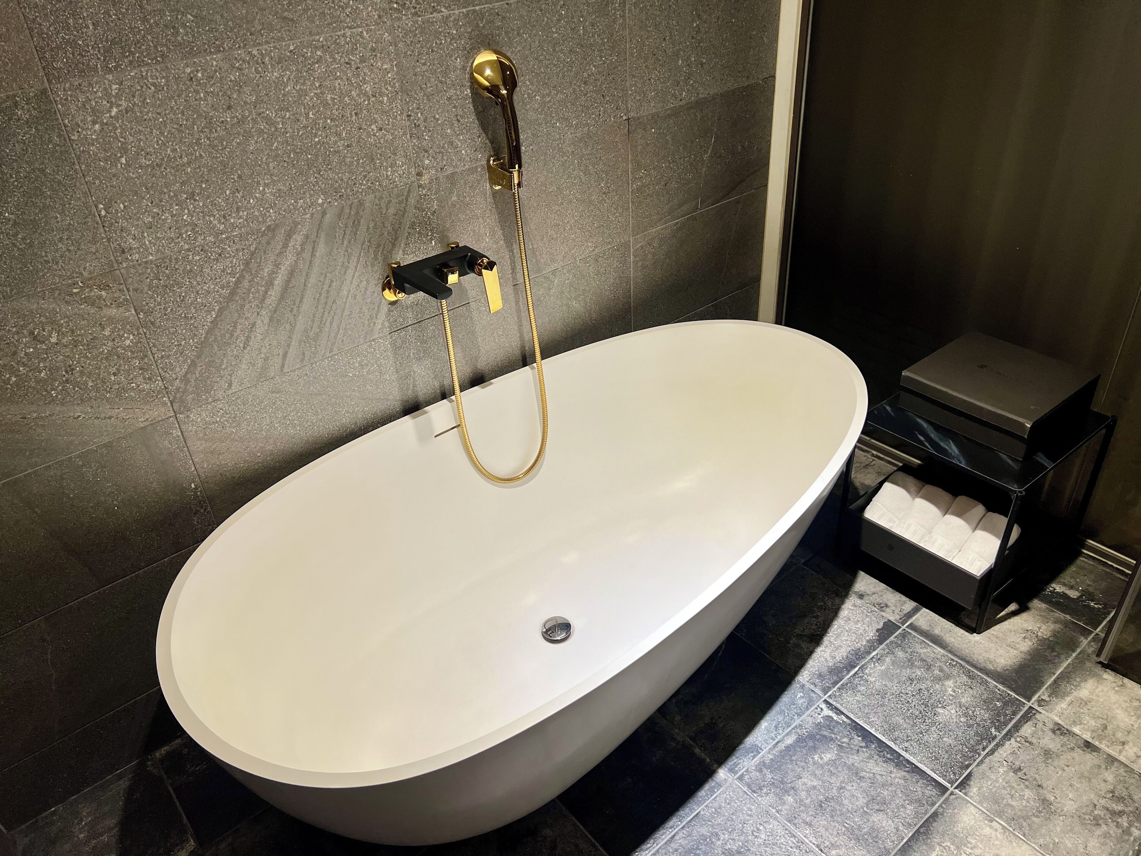 deluxe triple room | bathroom | free toiletries, hair dryer, slippers, bidet
