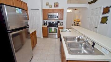 Family Villa, Garden Area | Shared kitchen | Fridge, microwave, oven