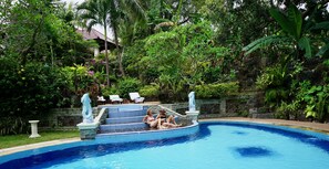 Outdoor pool, pool umbrellas, sun loungers