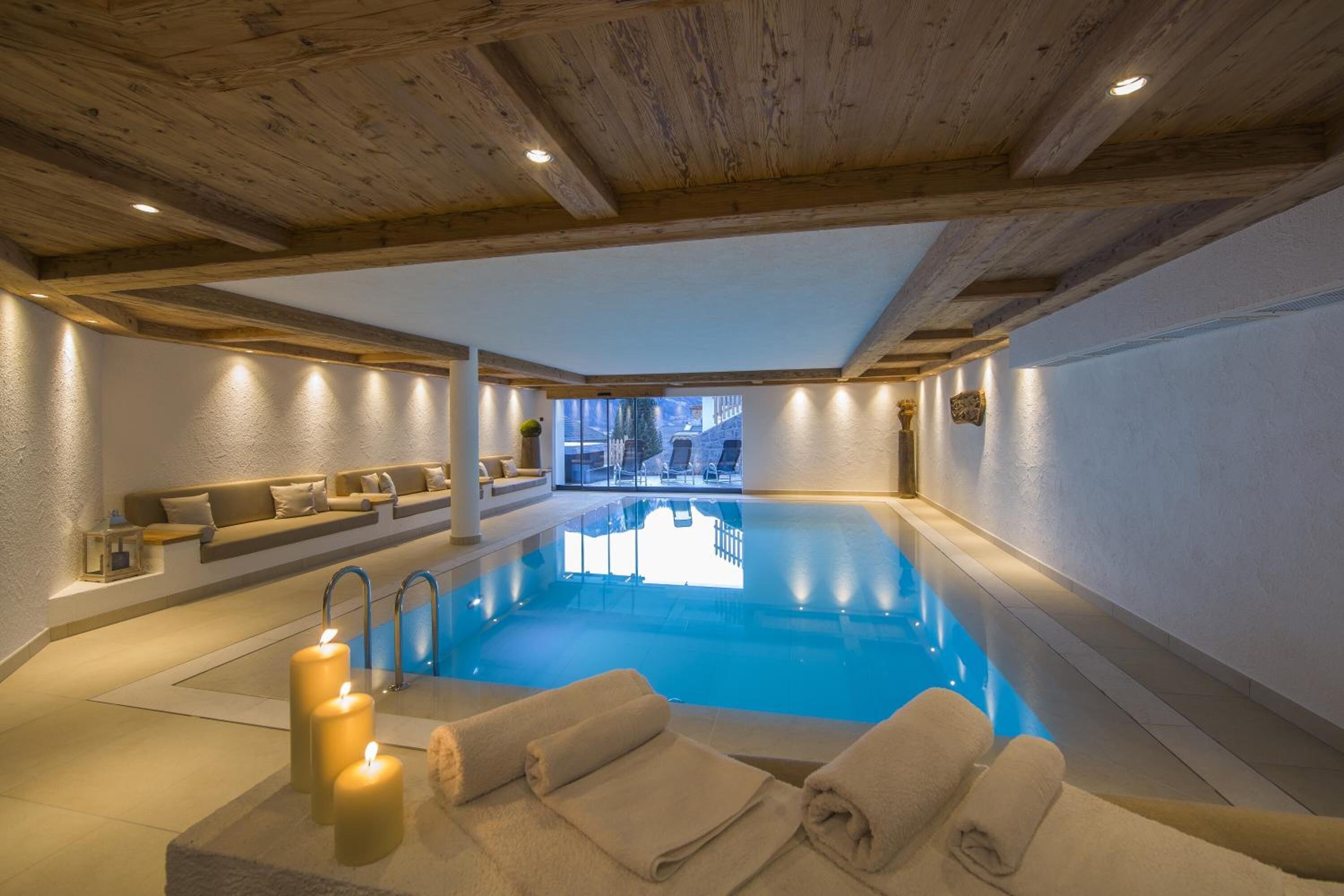 Indoor pool, open 8 AM to 8 PM, pool loungers