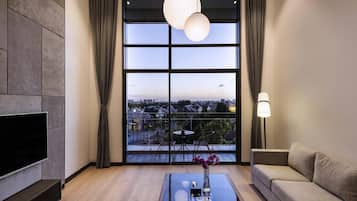 Deluxe Suite, 1 King Bed (Duplex) | In-room safe, individually decorated, iron/ironing board, free WiFi