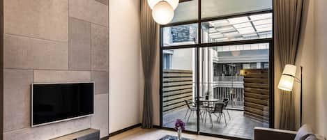 Executive Suite, 1 King Bed (Duplex) | In-room safe, individually decorated, iron/ironing board, free WiFi