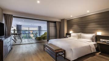 Executive Suite, 1 King Bed (Duplex) | In-room safe, individually decorated, iron/ironing board, free WiFi