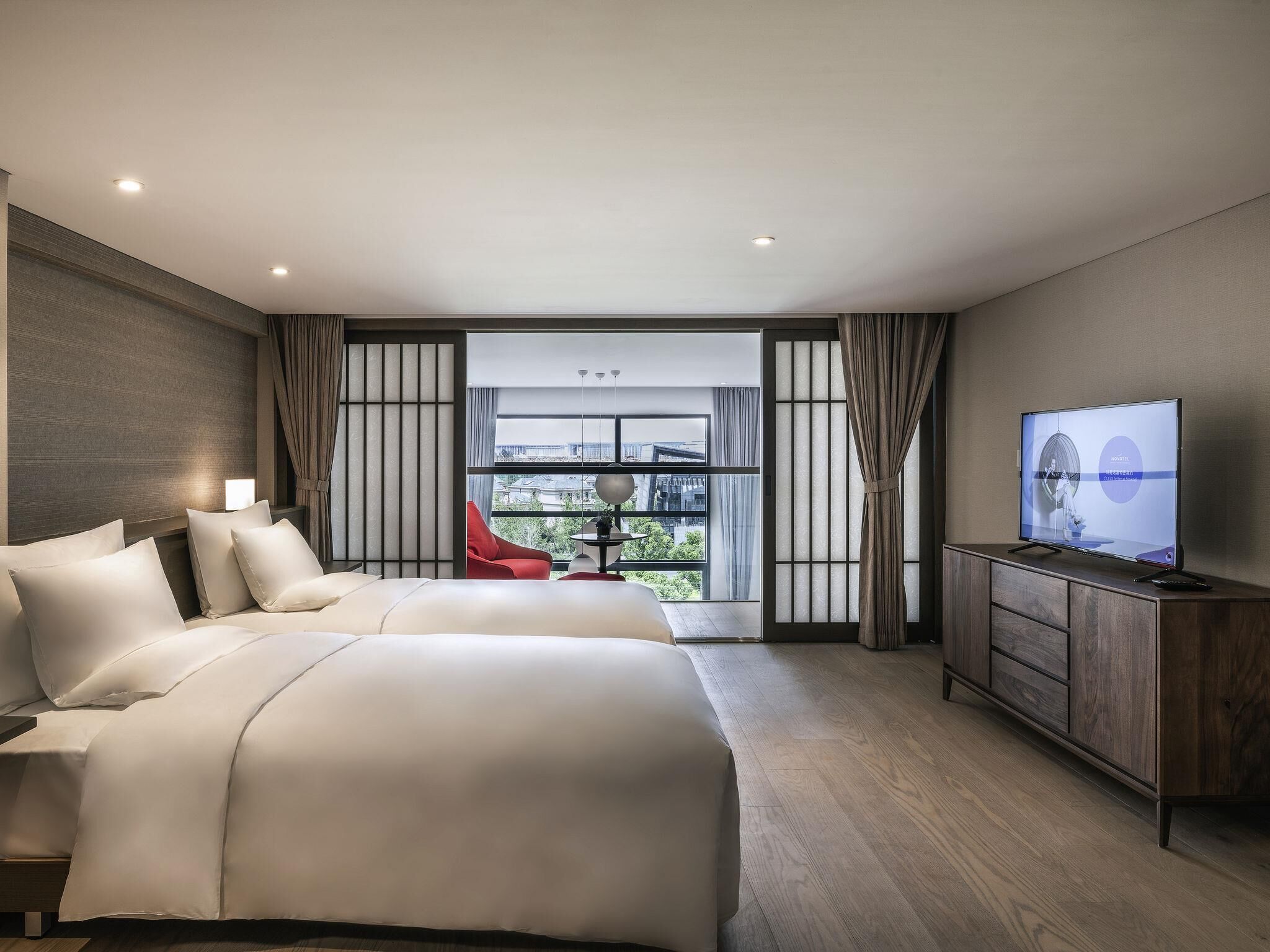 Suite Deluxe, 2 lits une place | Coffres-forts dans les chambres, décoration personnalisée