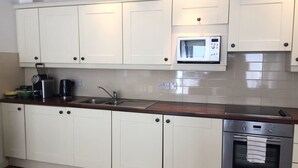 Apartamento, varias camas, no fumadores | Cocina privada | Hervidor eléctrico