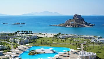 Indoor pool, outdoor pool, free pool cabanas, pool umbrellas