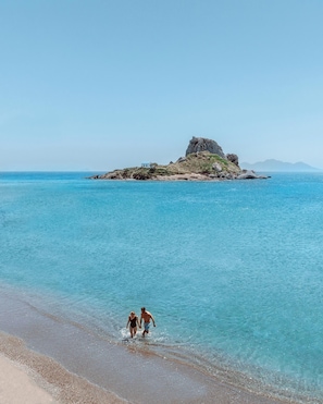 Private beach, white sand, sun-loungers, beach umbrellas