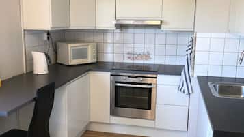 Habitación doble estándar | Cocina compartida | Refrigerador con congelador, microondas, horno y lavavajillas
