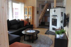 Comfort Cottage, Sauna | Living room | Flat-screen TV, DVD player