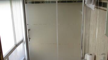 Shower, free toiletries, hair dryer, towels