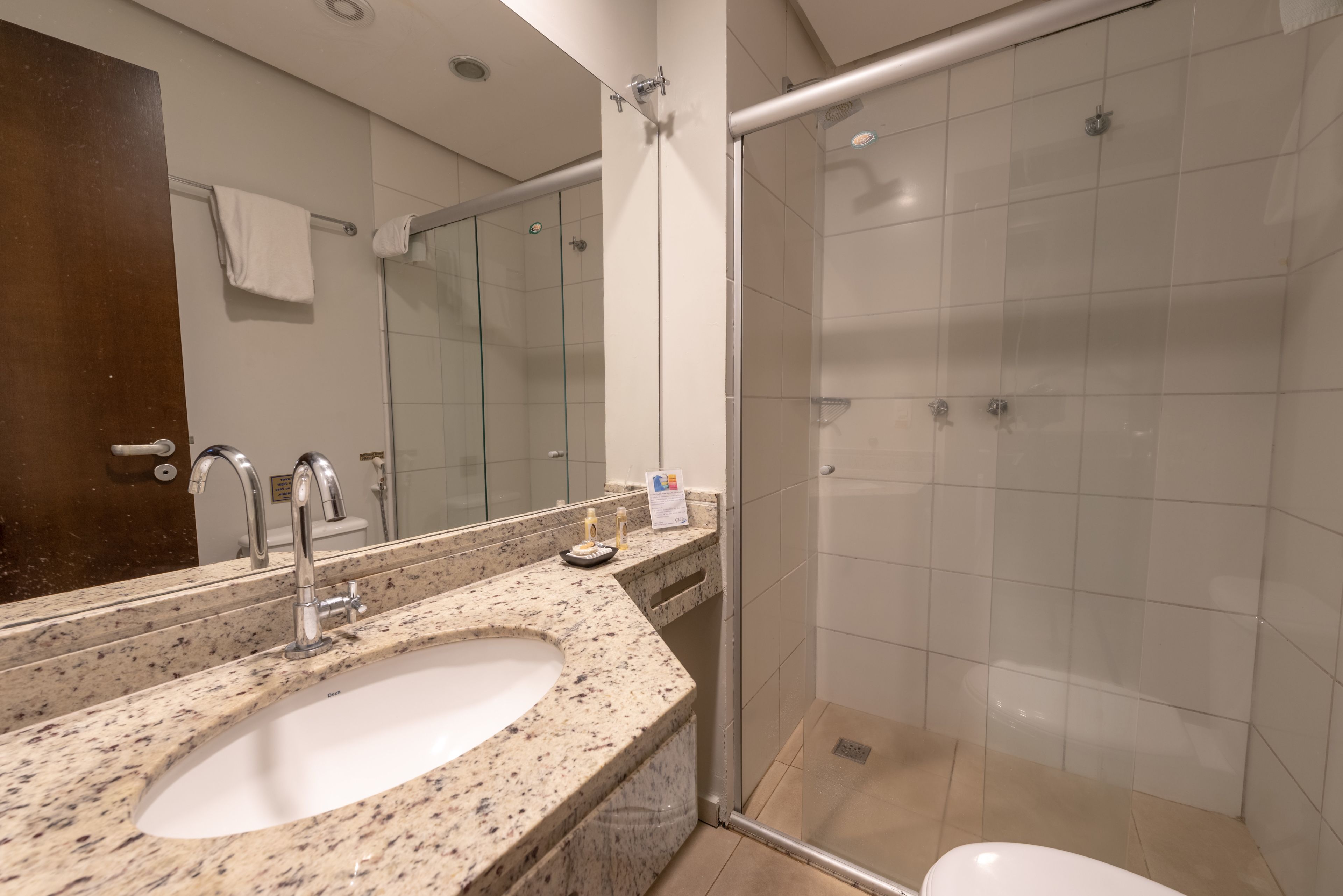 deluxe room (class) | bathroom | shower, free toiletries, towels