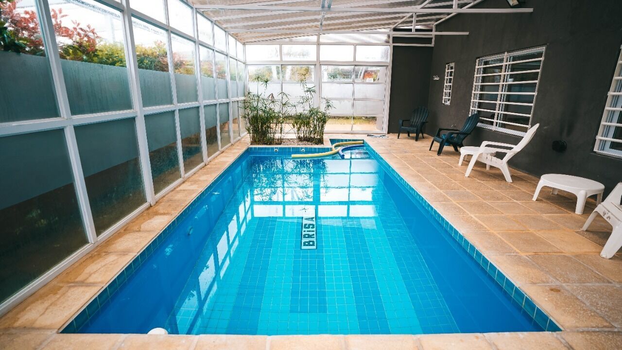 Indoor pool, open 9 AM to 9 PM, pool loungers