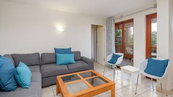 Superior Villa | Living area | Flat-screen TV