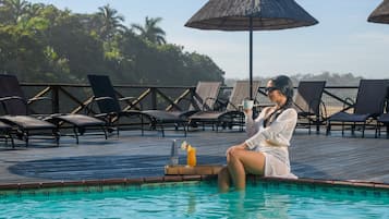 2 outdoor pools, pool umbrellas, pool loungers