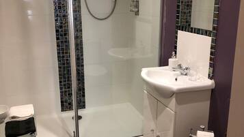 Shower, free toiletries, hair dryer, towels