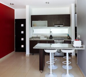 Family Apartment, 2 Bedrooms | Private kitchen | Fridge, microwave, oven, coffee/tea maker