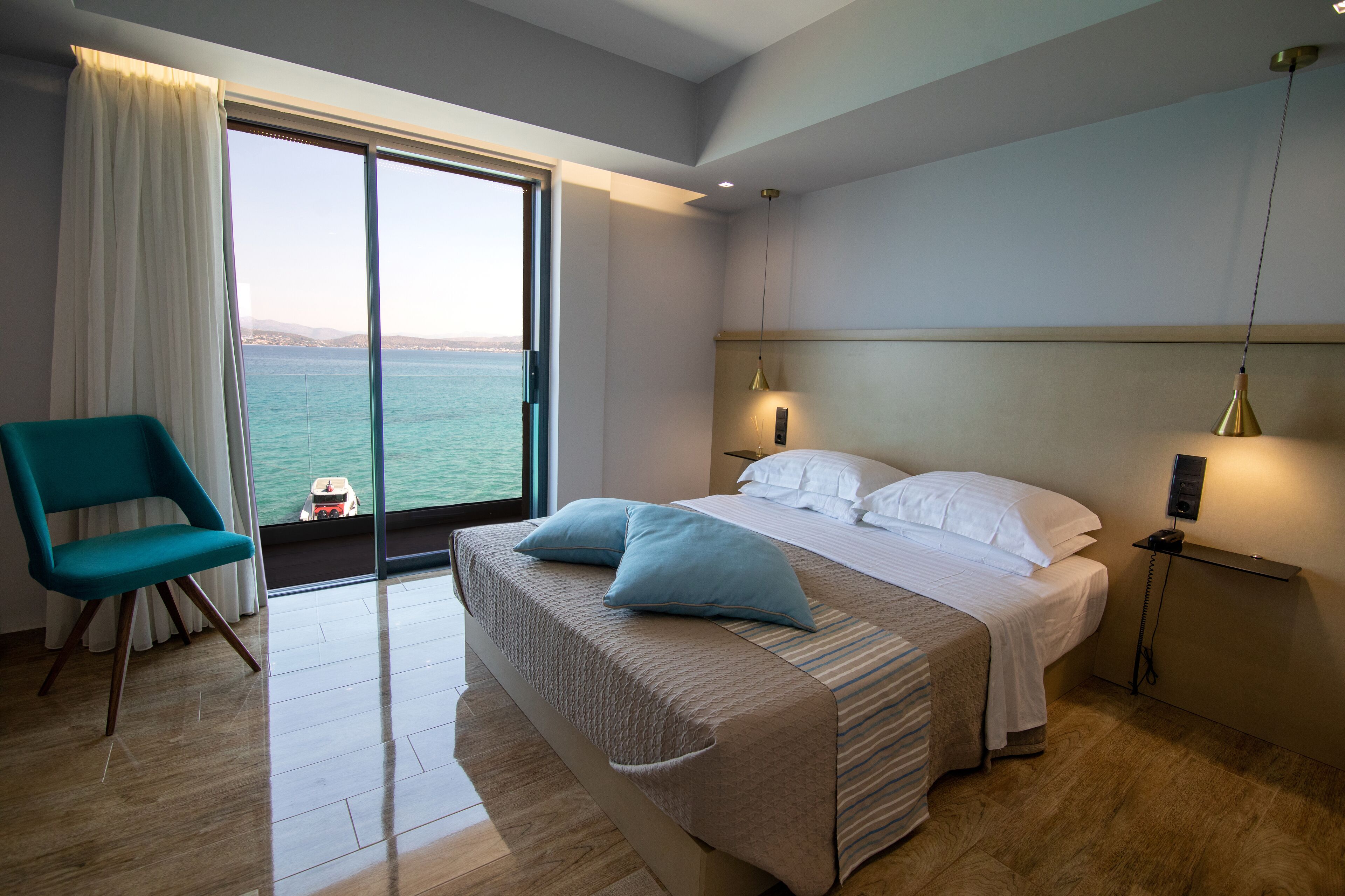 triple room, balcony, sea view | 1 bedroom, minibar, in-room safe, desk