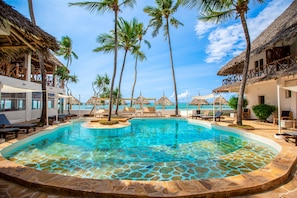 Outdoor pool, pool umbrellas, pool loungers - AHG Dream's Bay Beach Hotel - Adults Only (Matemwe)