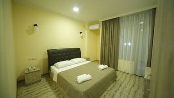 Standard Double or Twin Room | Minibar, desk, soundproofing, rollaway beds