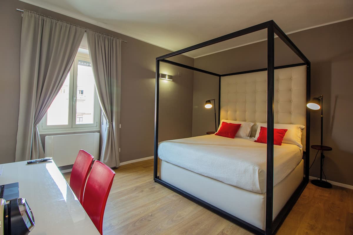 Deluxe-Zimmer (King Relax) | Minibar, individuell eingerichtet, Schreibtisch
