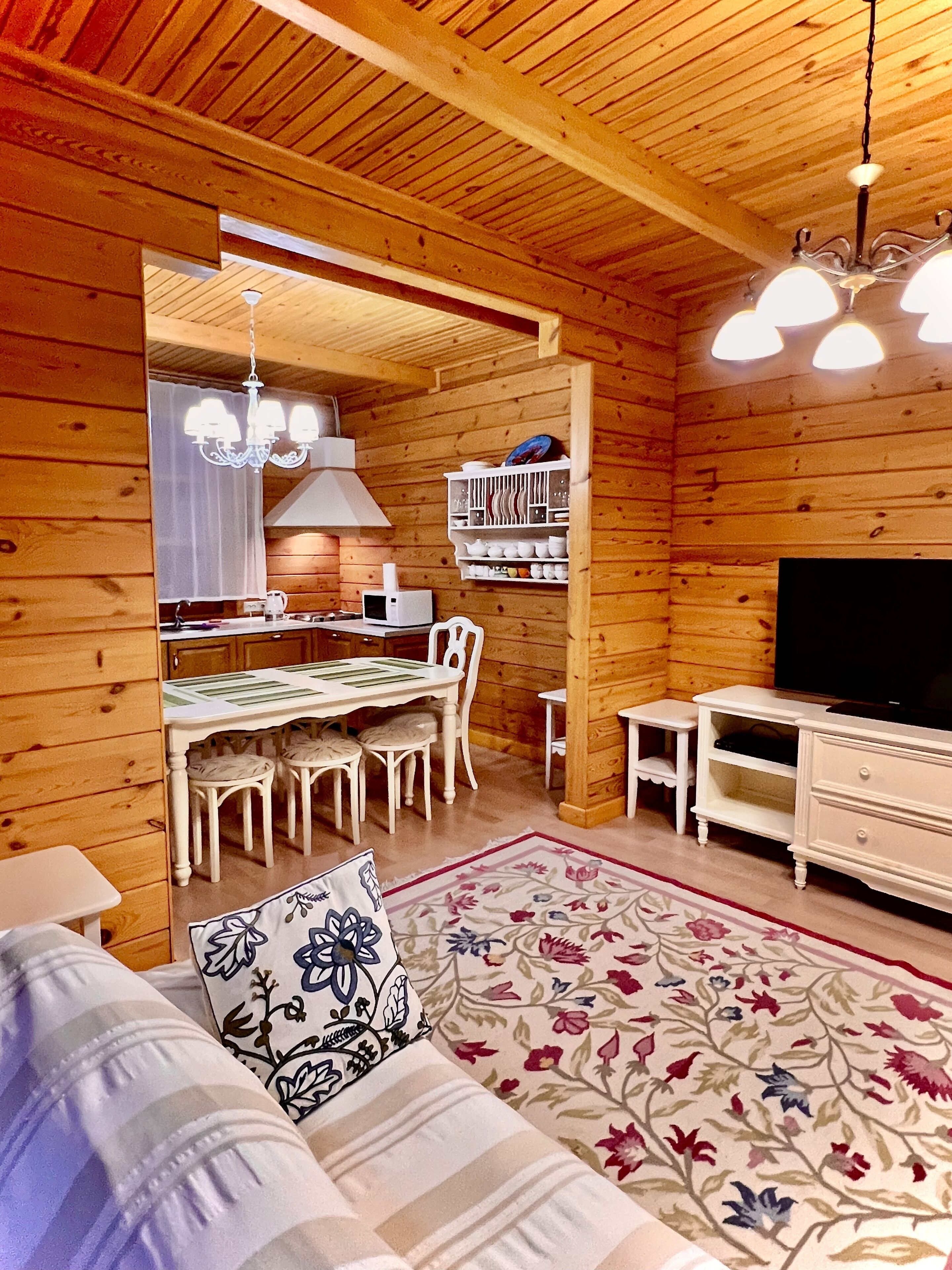 Standard Cottage, 3 Bedrooms, Mountain View, Beachfront (Chalet) | Living area | Plasma TV, fireplace, heated floors