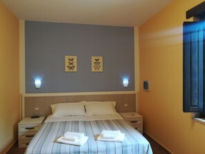 Una cassaforte in camera, lenzuola, accesso in sedia a rotelle