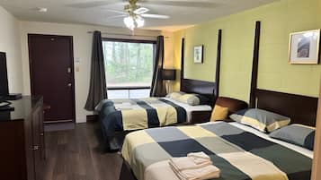 Urban Rustic Double Queen, Garden View | Minibar, individually decorated, individually furnished, blackout drapes