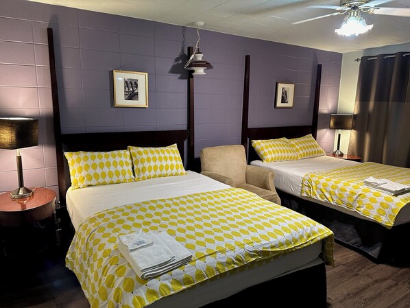 Urban Rustic Double Queen, Garden View | Minibar, individually decorated, individually furnished, blackout drapes