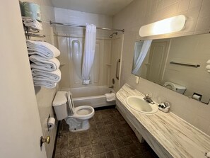 Combined shower/tub, free toiletries, towels, soap