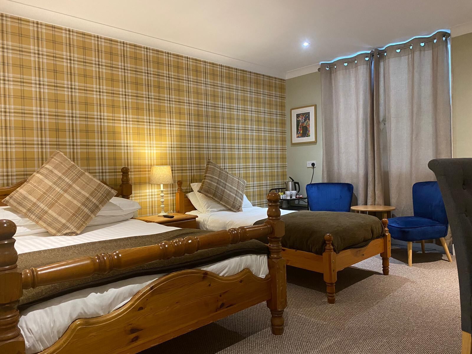 family room | 1 bedroom, individually decorated, individually furnished, desk