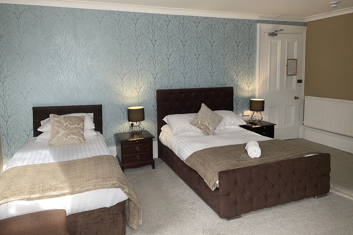 Family Room | 1 bedroom, individually decorated, individually furnished, desk