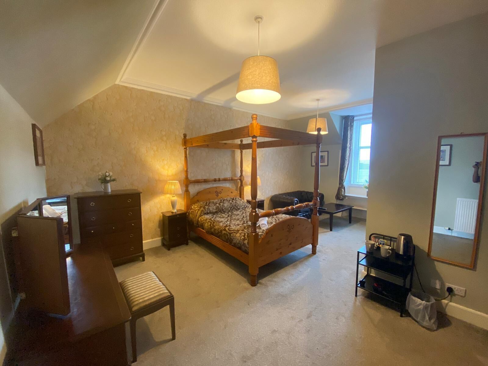 four poster bedroom | 1 bedroom, individually decorated, individually furnished, desk