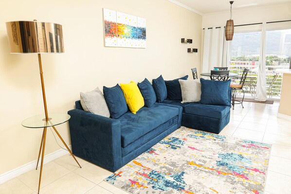 Condo (Bromptons41) | Living area | Flat-screen TV