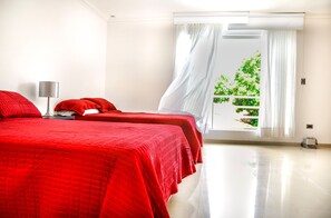 Twin Room, Multiple Beds | Minibar, in-room safe, blackout drapes, iron/ironing board