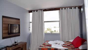 Premium bedding, blackout curtains, iron/ironing board, free WiFi